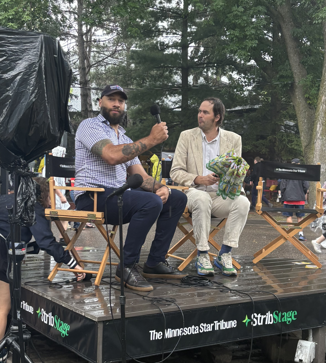 Republican Senate Candidate and ex-NBA Player Royce White (left) spoke with The Minnesota Star Tribune agriculture reporter Christopher Vondracek (right) in an interview at the Minnesota State Fair on Aug. 22.